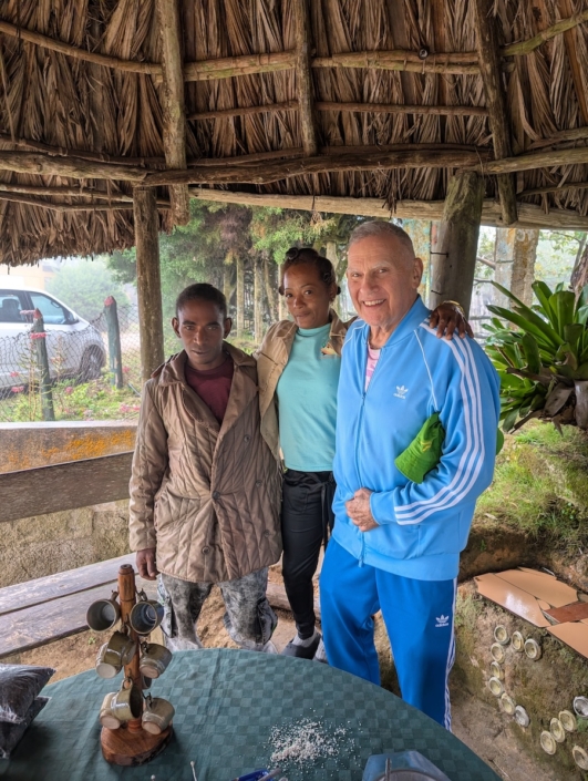 With Jenny and Daniel while they prepare coffee on their farm